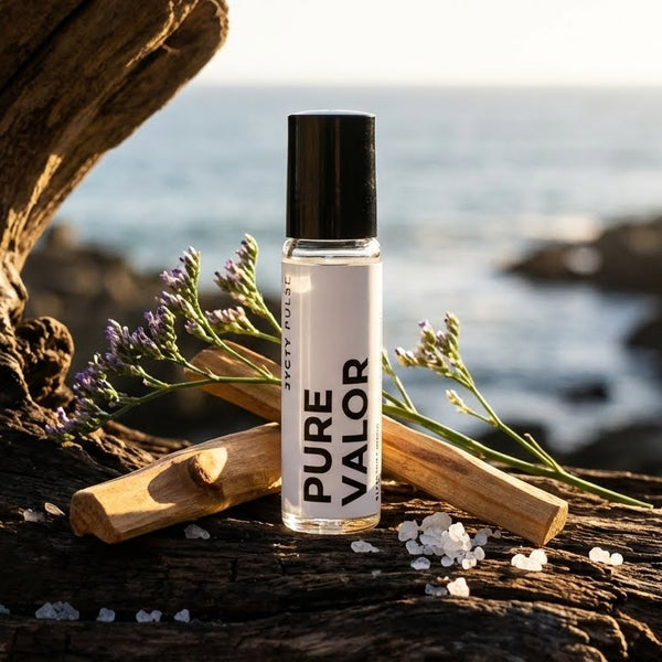 Bottle of 'Pure Valor' on a rocky surface with ocean view